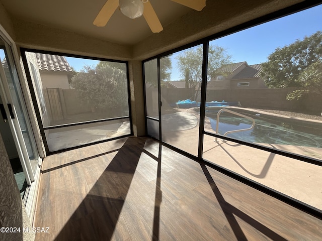 unfurnished sunroom with a wealth of natural light