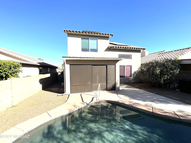 2655 W Desert Brook Ct, Tucson, AZ 85742 - rear view of property featuring a tiled roof, stucco siding, and a patio