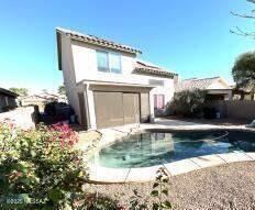 2655 W Desert Brook Ct, Tucson, AZ 85742 - rear view of property featuring an attached garage