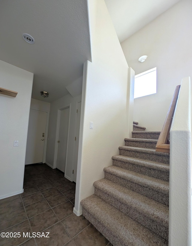 2655 W Desert Brook Ct, Tucson, AZ 85742 - staircase with tile patterned flooring and baseboards