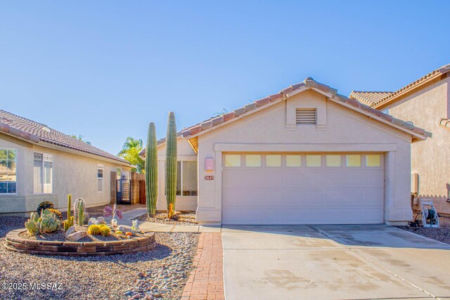 view of front of home featuring a garage