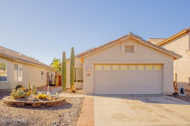 view of front of home with a garage