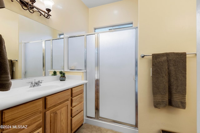 bathroom featuring vanity and walk in shower