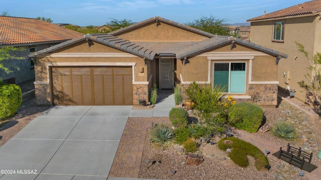 view of front of property with a garage