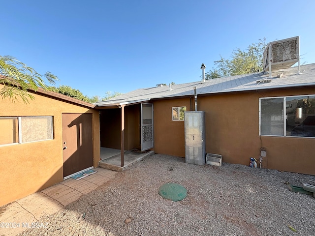 back of house featuring a patio