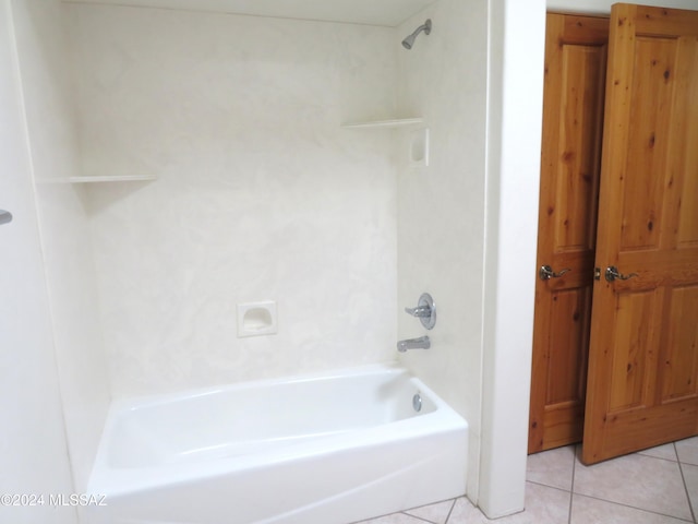 bathroom featuring shower / bathtub combination and tile patterned floors