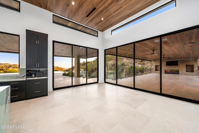 interior space featuring ceiling fan