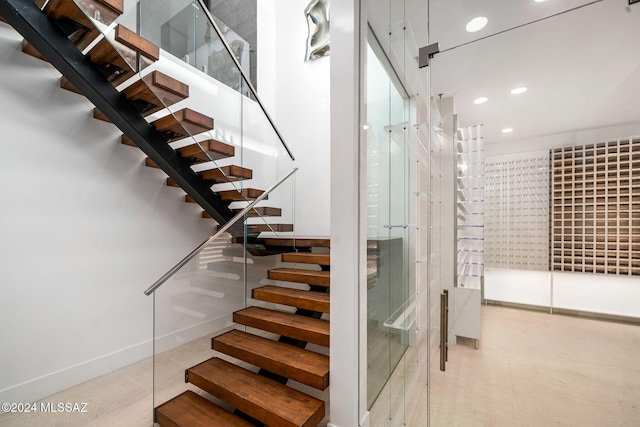 3569 E Secret Canyon Pl, Tucson, AZ 85718 - staircase with recessed lighting, baseboards, and tile patterned floors