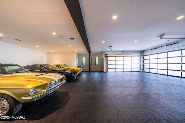 3569 E Secret Canyon Pl, Tucson, AZ 85718 - garage featuring recessed lighting