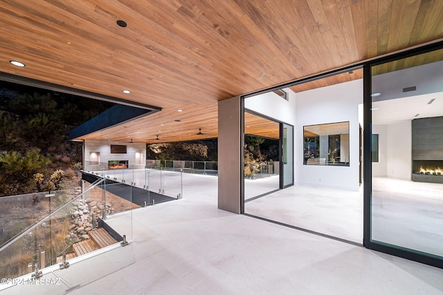 view of patio featuring a balcony