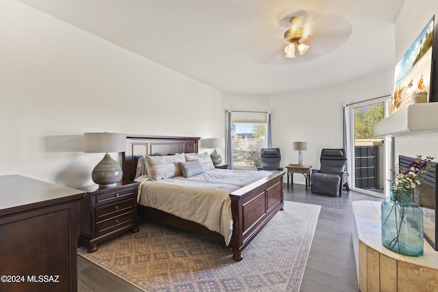 bedroom featuring multiple windows and ceiling fan