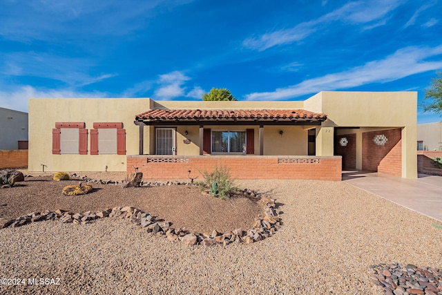 view of pueblo revival-style home