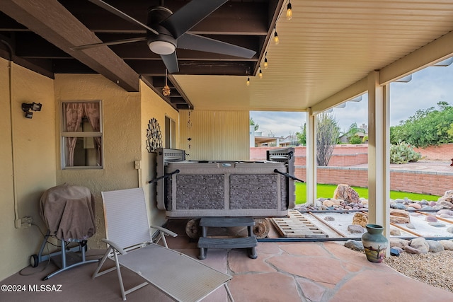 view of patio with ceiling fan