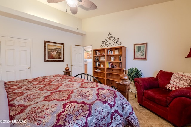 tiled bedroom with ceiling fan