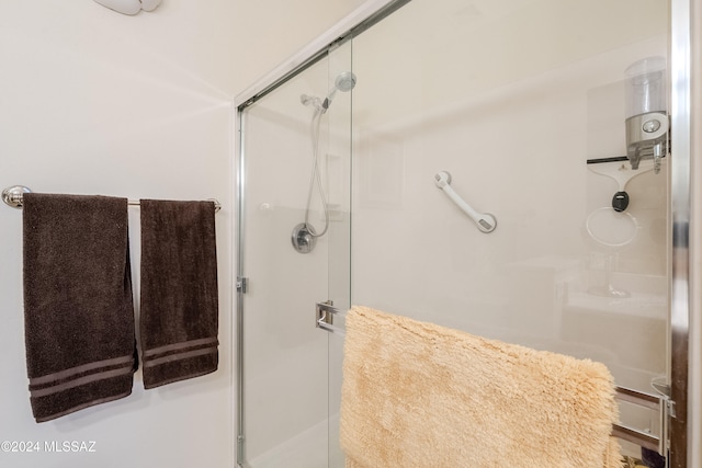 bathroom with an enclosed shower