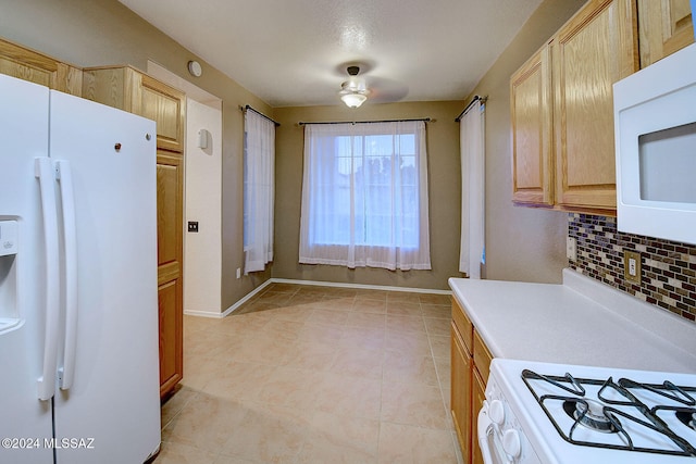 kitchen with light tile patterned floors, ceiling fan, backsplash, light brown cabinetry, and white appliances