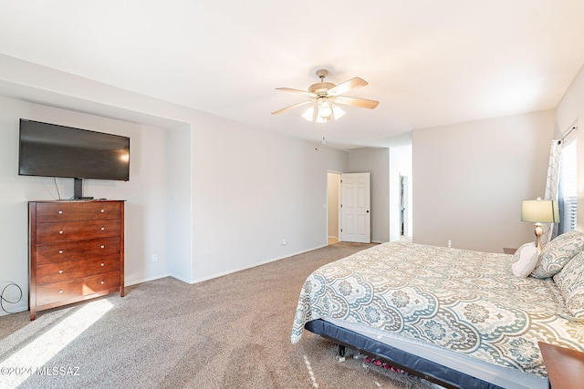 carpeted bedroom featuring a ceiling fan