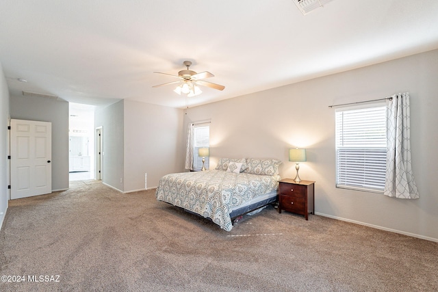 bedroom featuring carpet, visible vents, ceiling fan, and baseboards