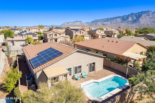 exterior space featuring a residential view and a mountain view