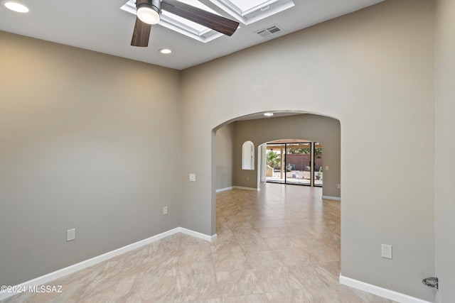 spare room with ceiling fan