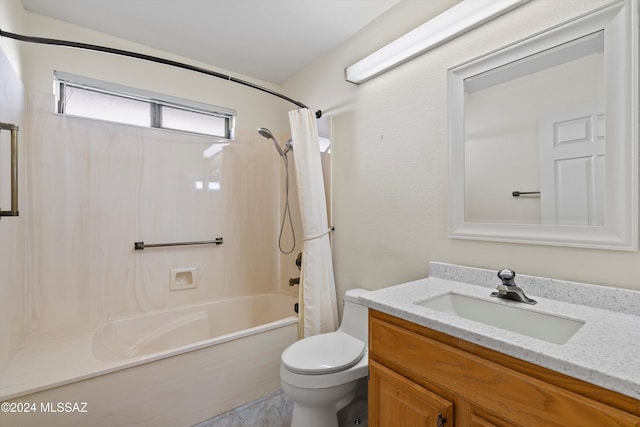 full bathroom featuring tile patterned flooring, vanity, toilet, and shower / bathtub combination with curtain