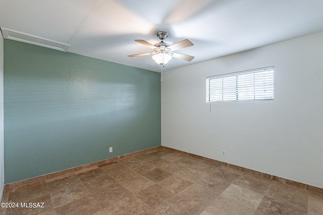 unfurnished room featuring ceiling fan