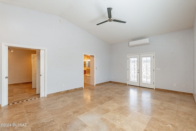 spare room with french doors, a wall mounted AC, high vaulted ceiling, and ceiling fan