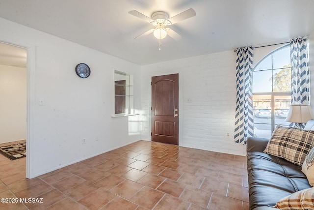 interior space featuring a ceiling fan