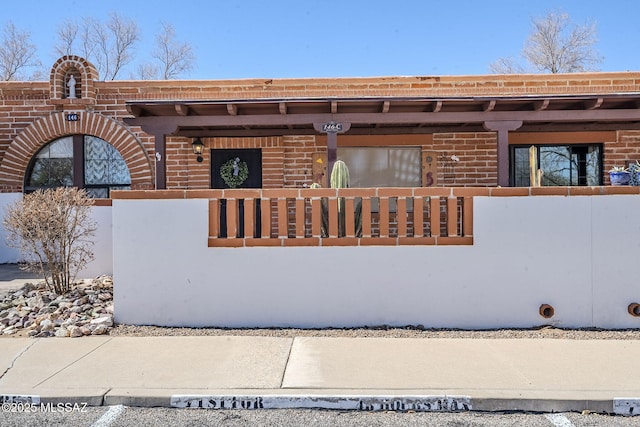 view of front facade with brick siding