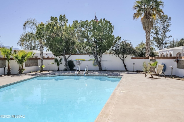 view of pool featuring a fenced backyard and a fenced in pool