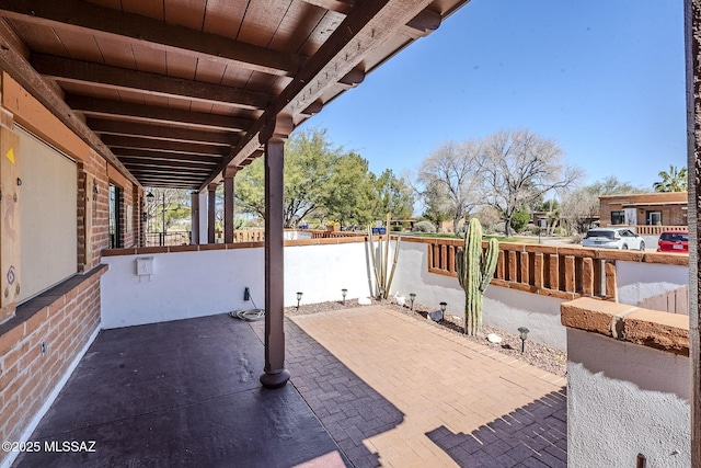 view of patio / terrace with fence