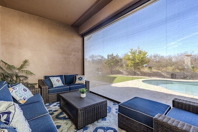 view of patio / terrace featuring an outdoor hangout area and a fenced in pool