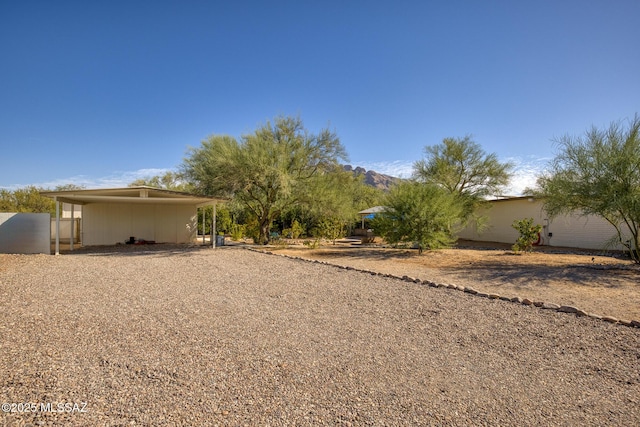 view of yard with a carport