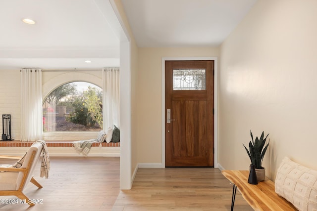 foyer with a healthy amount of sunlight and light wood-type flooring