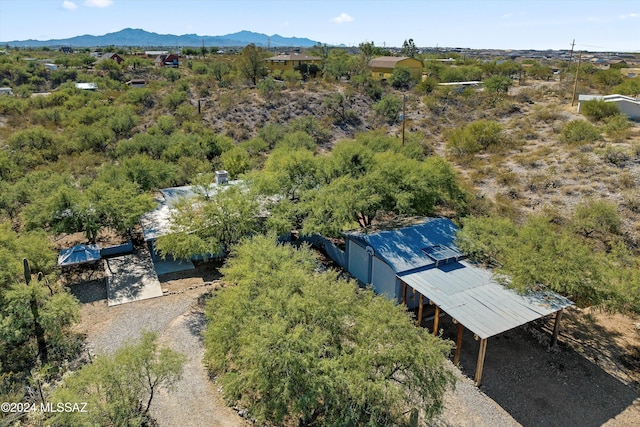 birds eye view of property featuring a mountain view