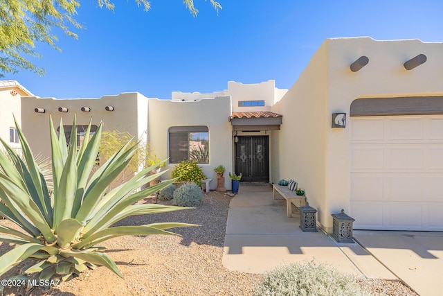 property entrance featuring a garage