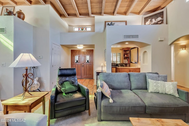 tiled living room with beam ceiling and wood ceiling