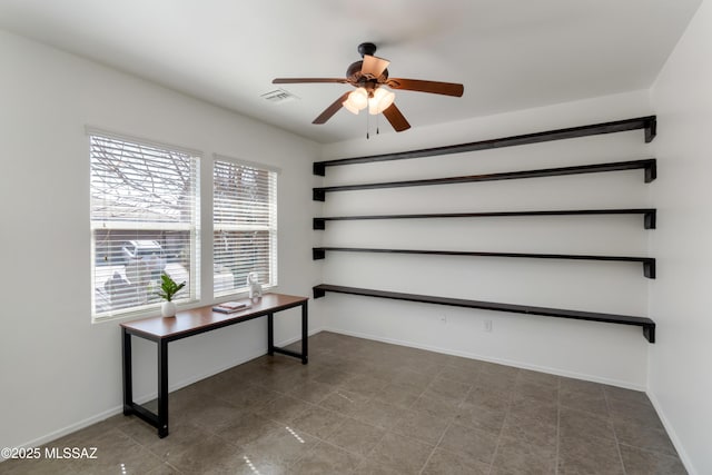 office area with visible vents, ceiling fan, and baseboards