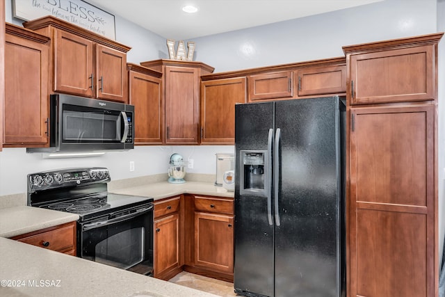 kitchen featuring black appliances