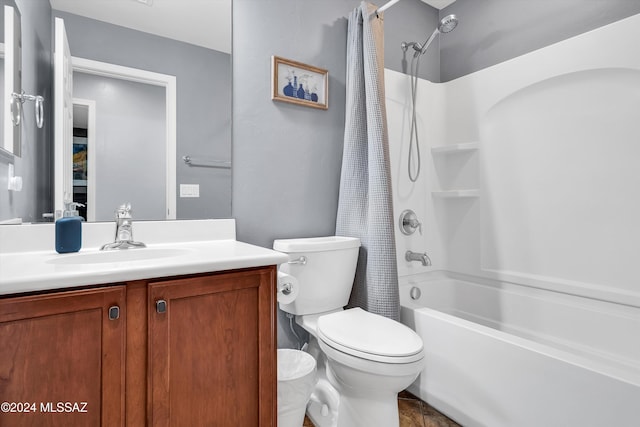 full bathroom with toilet, shower / tub combo, and vanity