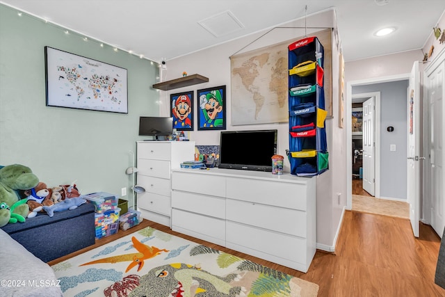 bedroom featuring light wood-type flooring