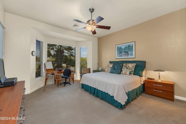 bedroom featuring ceiling fan and carpet floors