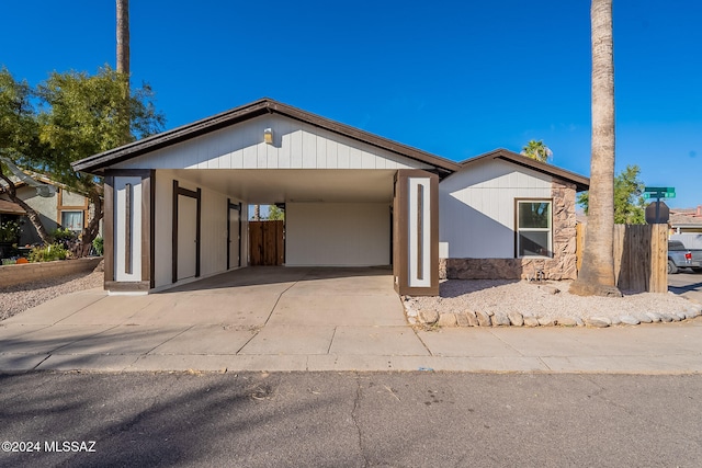 view of front of property with a carport