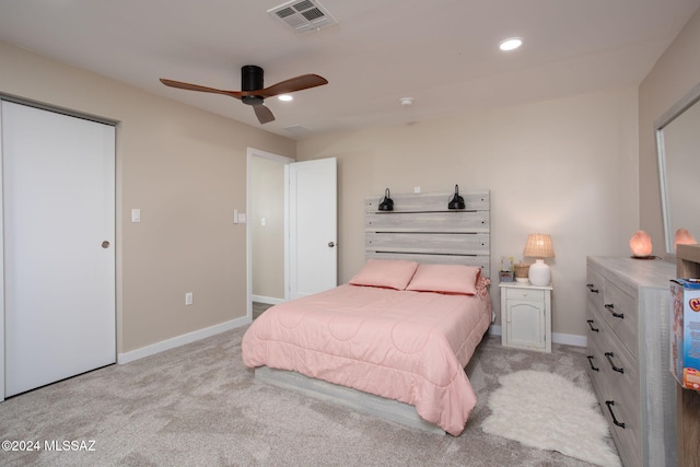 carpeted bedroom featuring ceiling fan