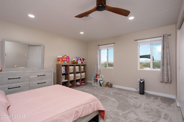 carpeted bedroom featuring ceiling fan