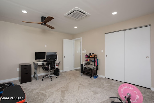 office area featuring light colored carpet and ceiling fan