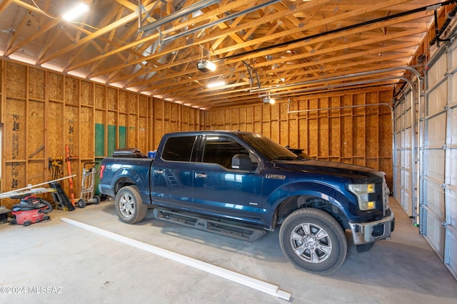 garage featuring a garage door opener