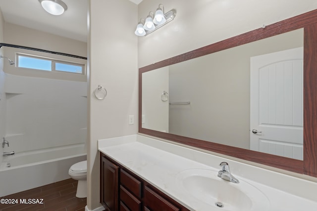 full bathroom with wood-type flooring, vanity, toilet, and shower / bath combination