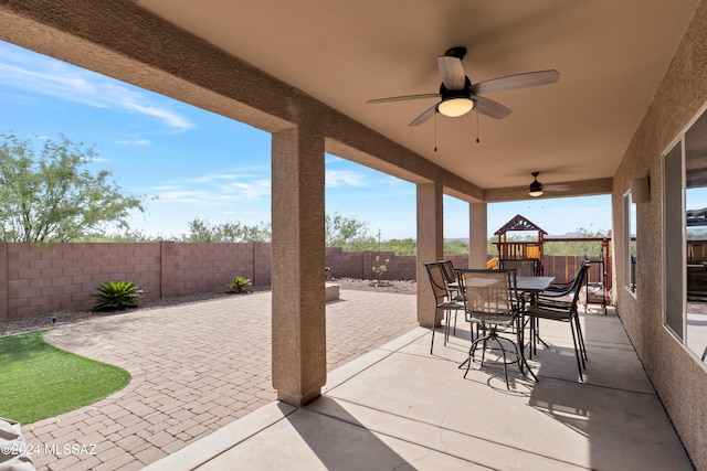 view of patio / terrace featuring ceiling fan