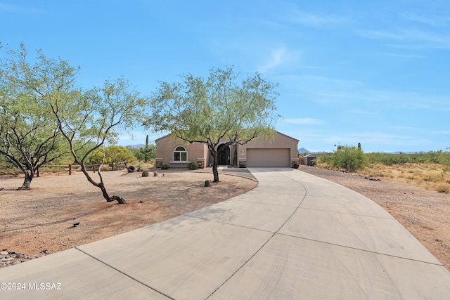 view of front of home featuring a garage